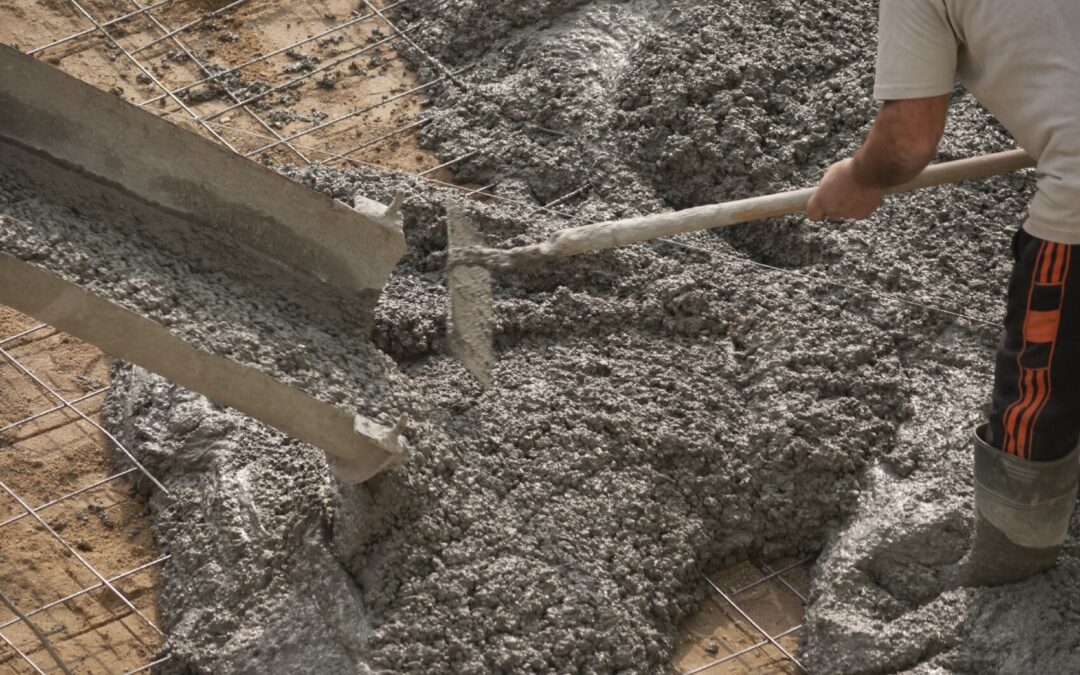 concrete, image of man mixing concrete